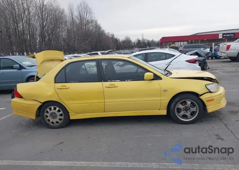 2002 Mitsubishi Lancer Oz Rally z USA, uszkodzony, nr VIN JA3AJ86E32U074185